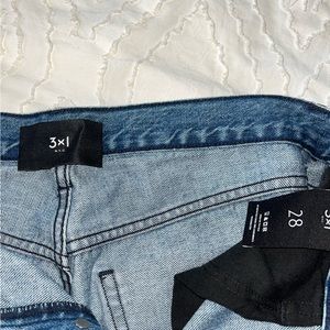 3X1 straight wide leg denim with fringe. Size 28